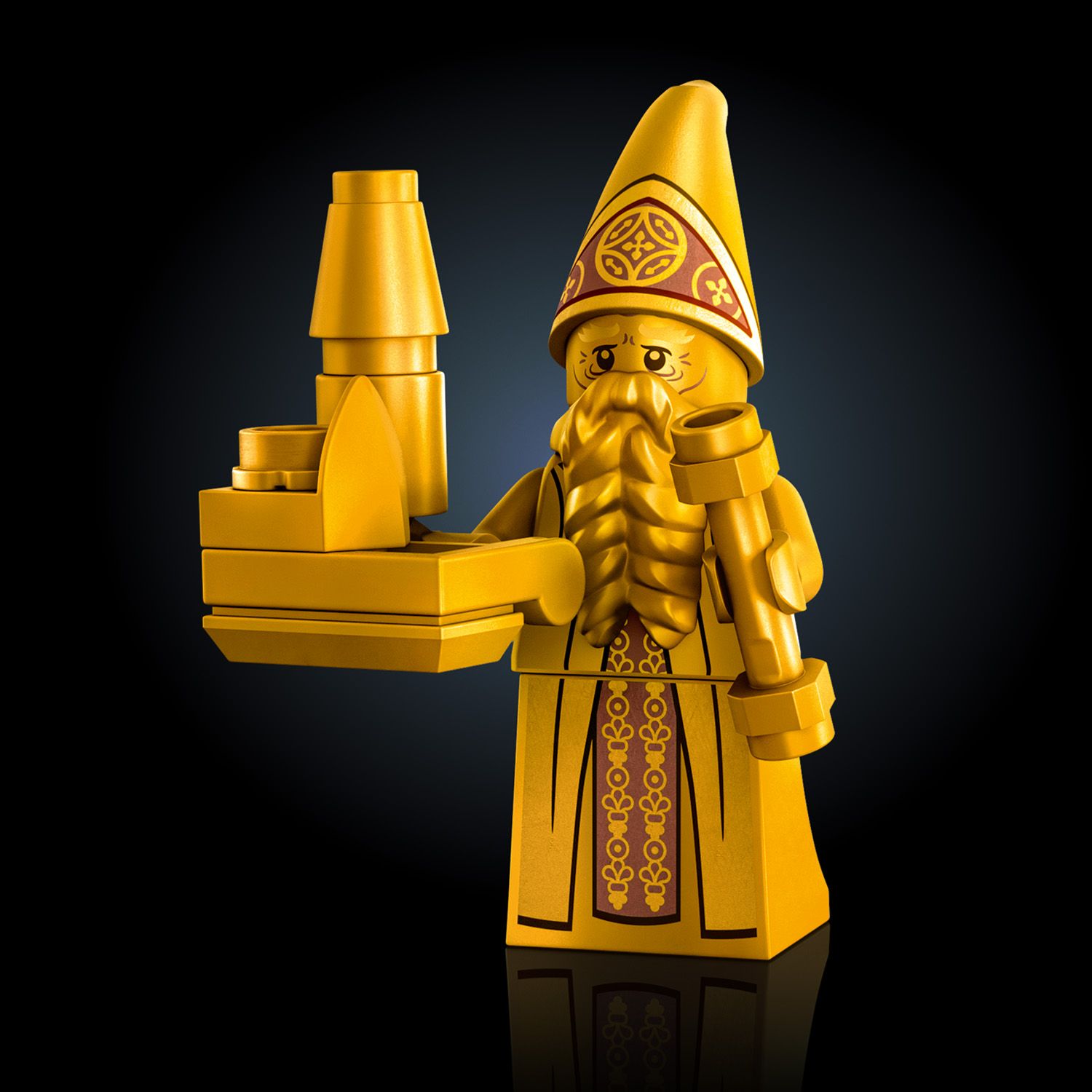 Architekt Hogwartu obok tabliczki z napisem